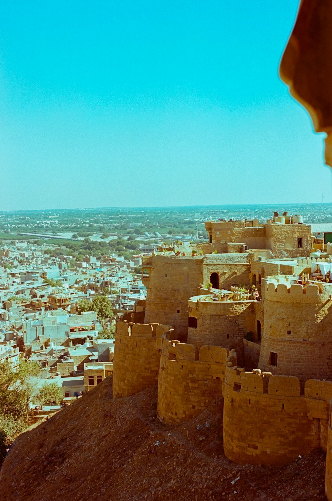 Ancient sandstone Jaisalmer Fort overlooking the golden city of Jaisalmer, Rajasthan, at sunset